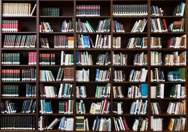 A bookshelf full of books. Photo